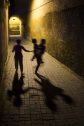 KIds play in an alley on the street in Marrakesch, Morocco.